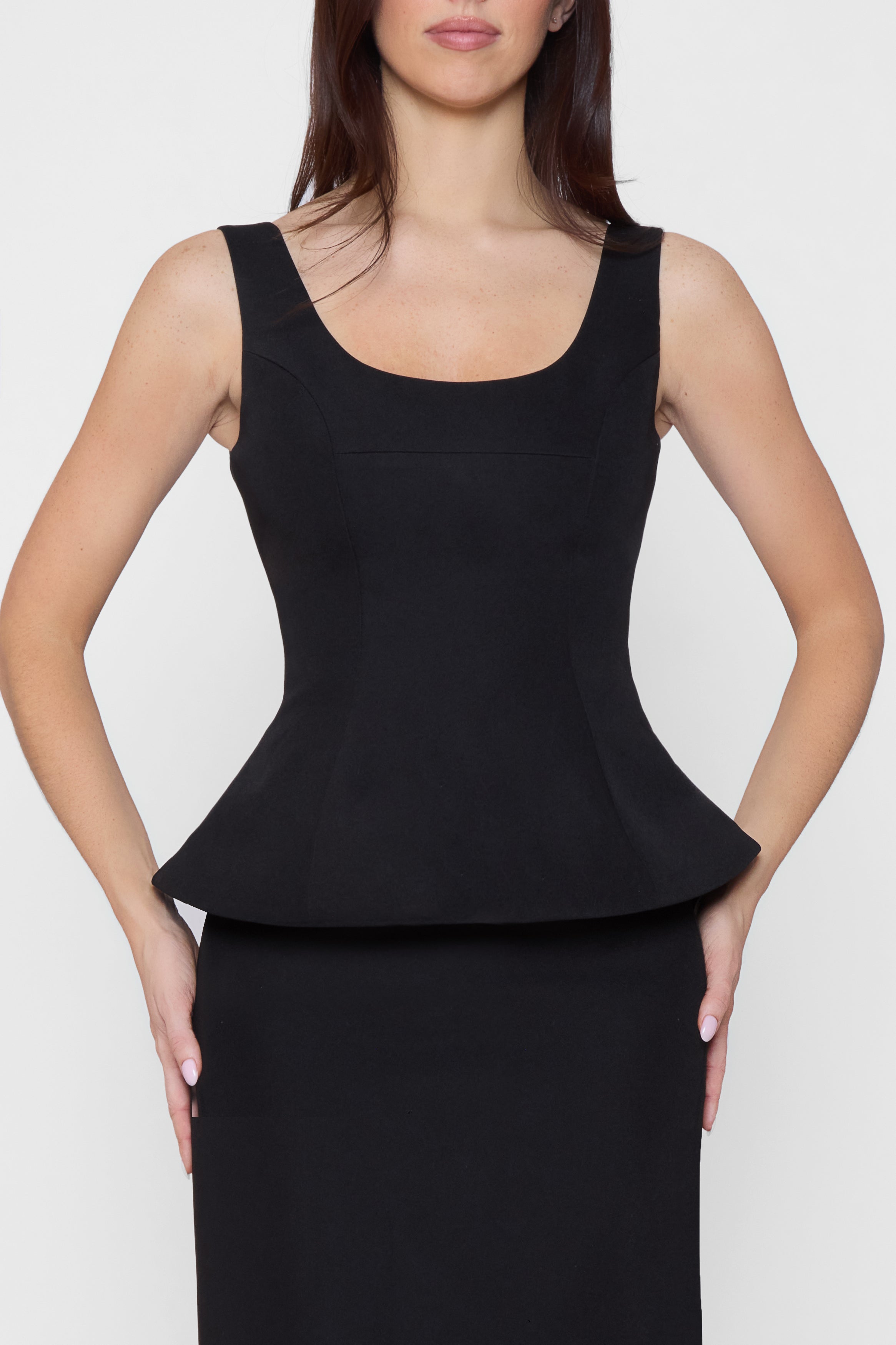 Model wearing LEAU Calesia Contour Bustier Top in Black, front view.