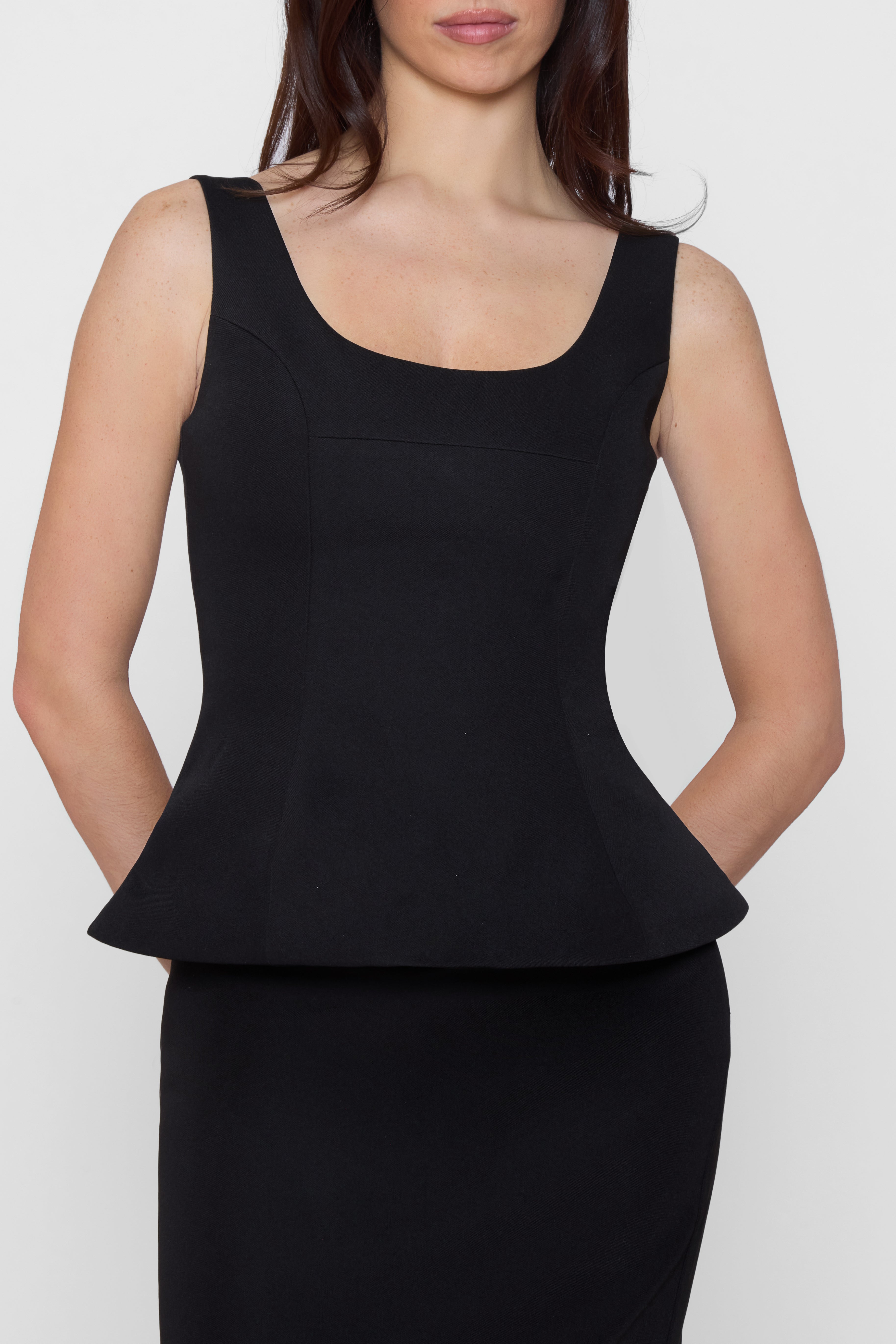 Model wearing LEAU Calesia Contour Bustier Top in Black, front view.