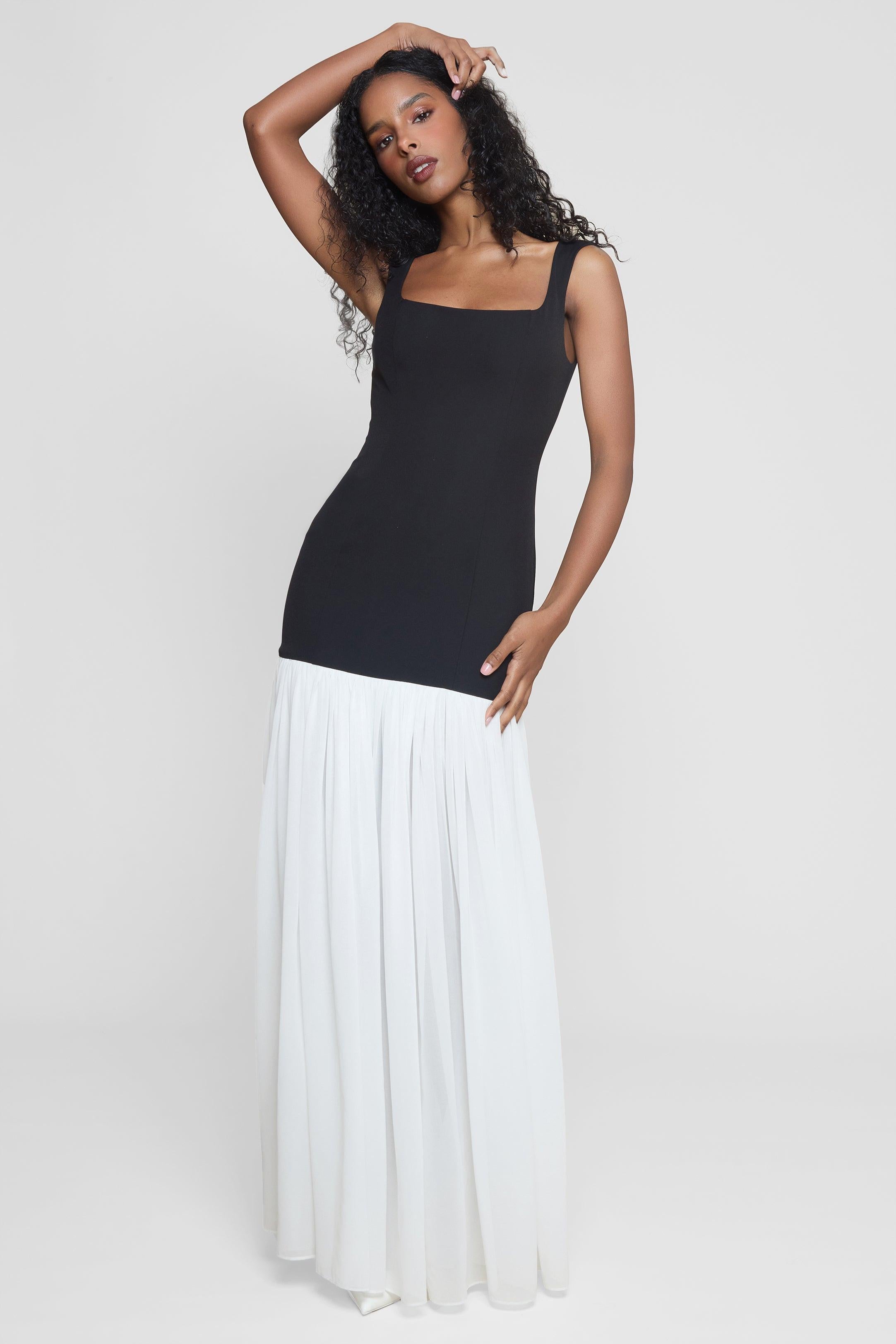 Model wearing Phantom Contrast Chiffon Maxi Dress in Black/White, front view.