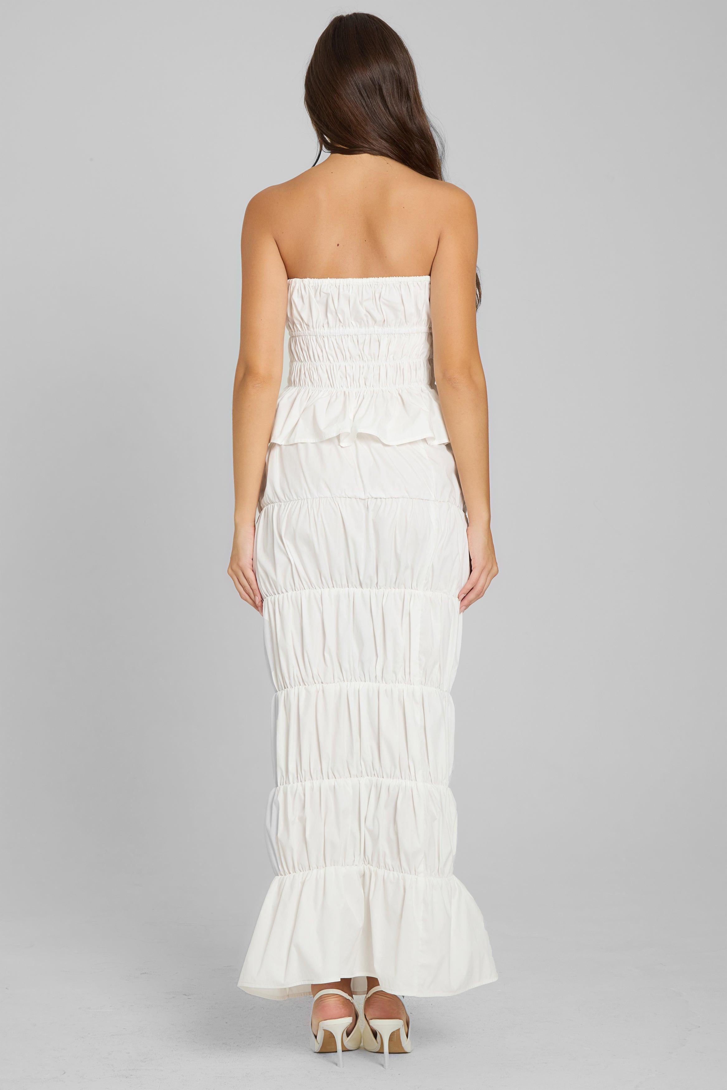 Model wearing Reverie Ruffle Two Piece Set in White, back view.