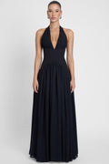 Model is wearing Harlowe Corset Maxi Dress Black, front view.