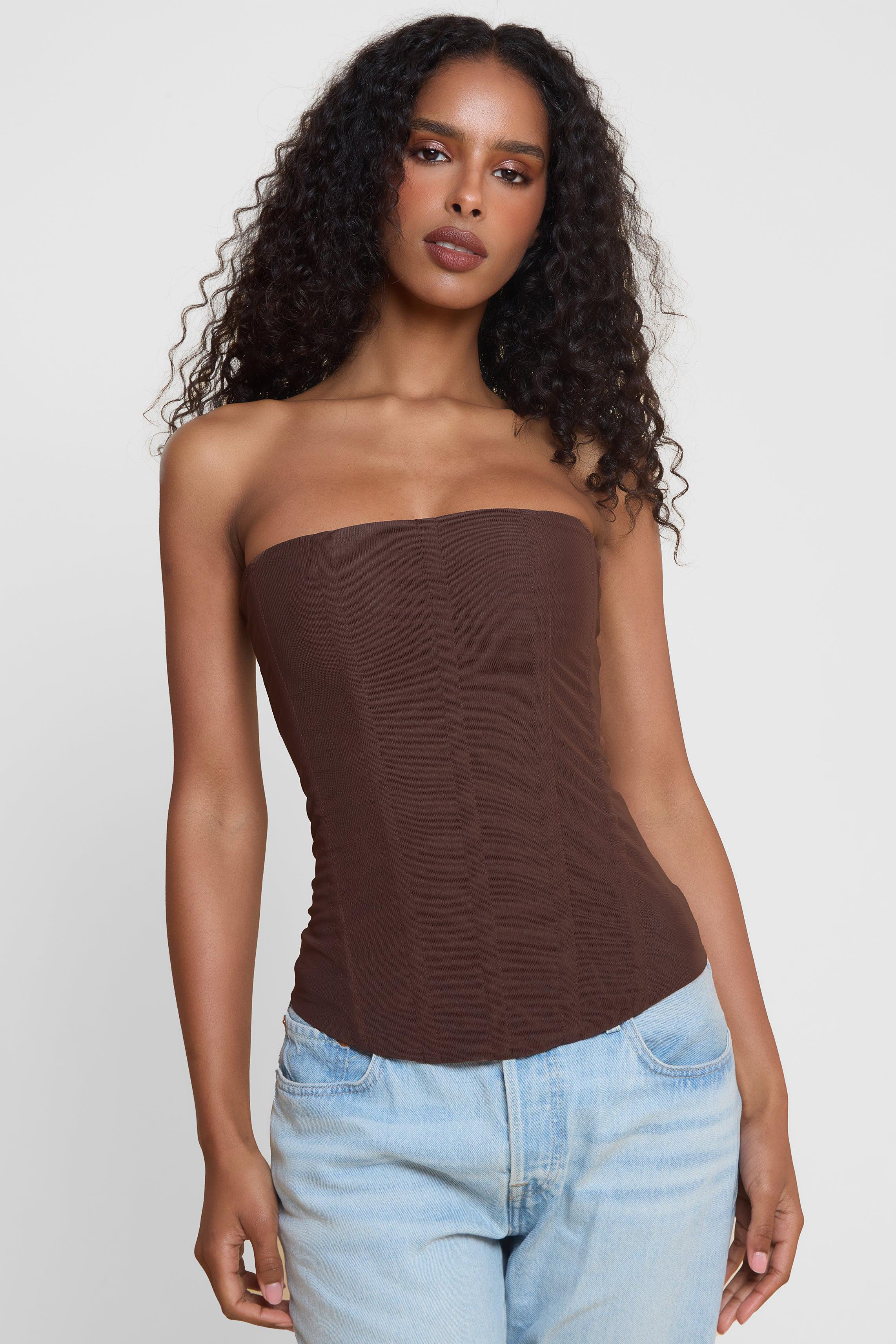 Model wearing Muse Mesh Corset Top in Chocolate Brown, front view.