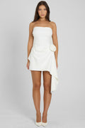 Model wearing Rosette Strapless Mini Dress in White, front view.
