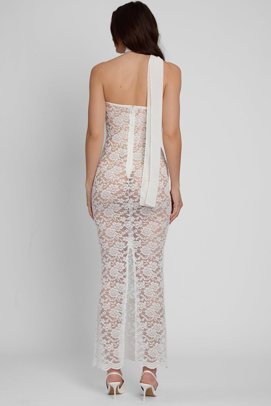 Model wearing Soleil Scalloped Lace Midi Dress in White, back view.