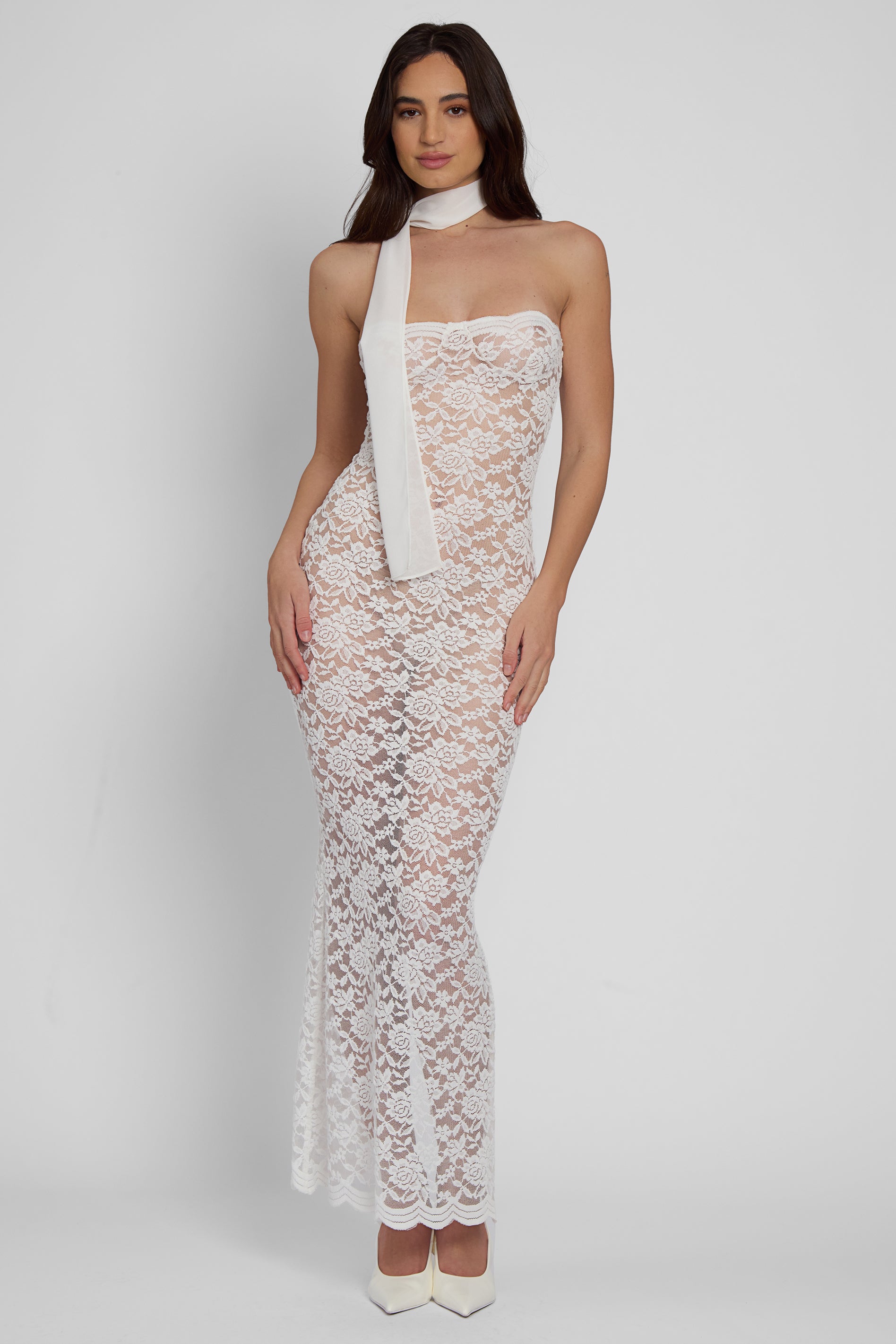 Model wearing Soleil Scalloped Lace Midi Dress in White, front view.