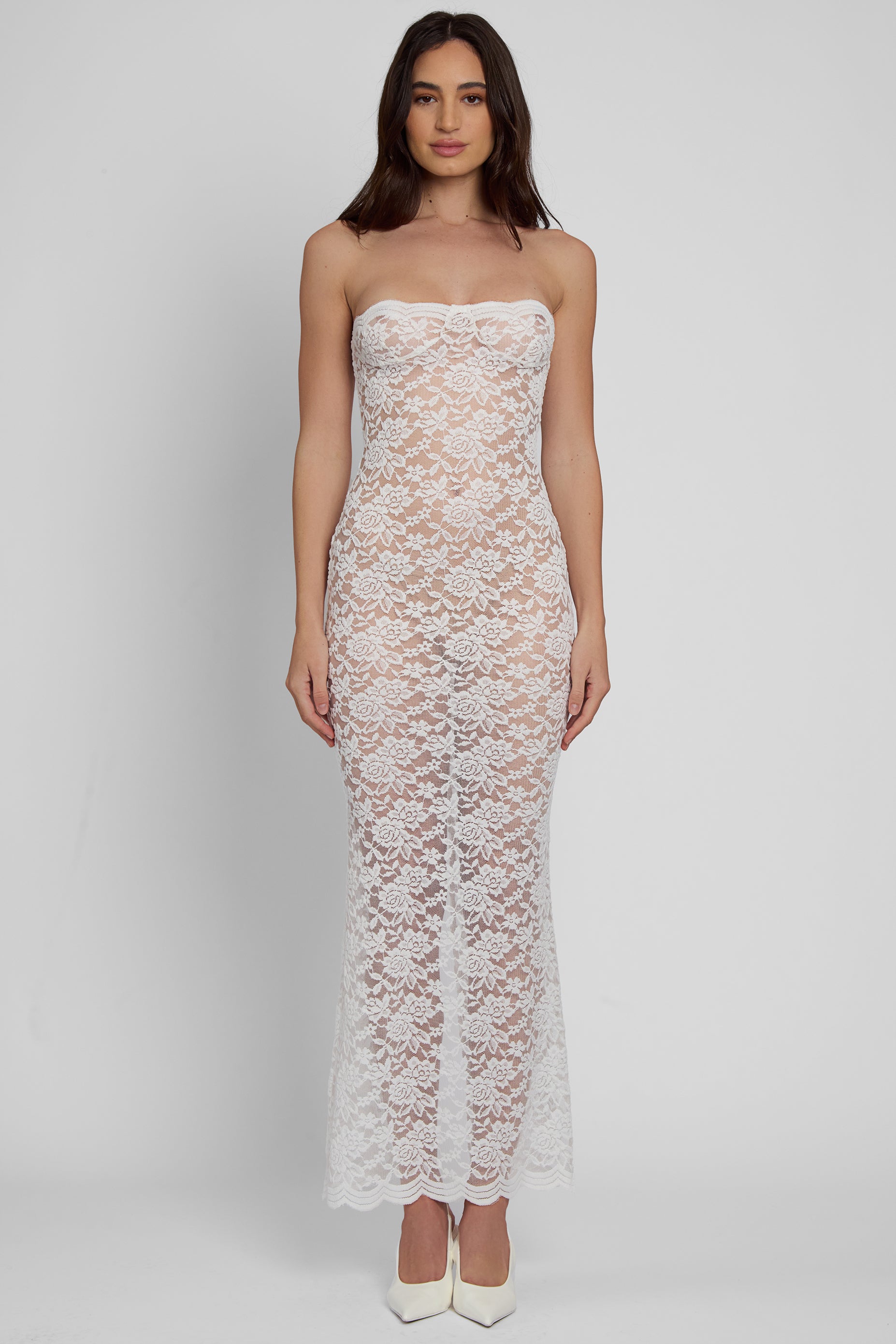 Model wearing Soleil Scalloped Lace Midi Dress in White, front view.