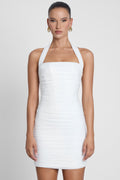 Model is wearing Toulouse Halter Corset Mini Dress White, front view.